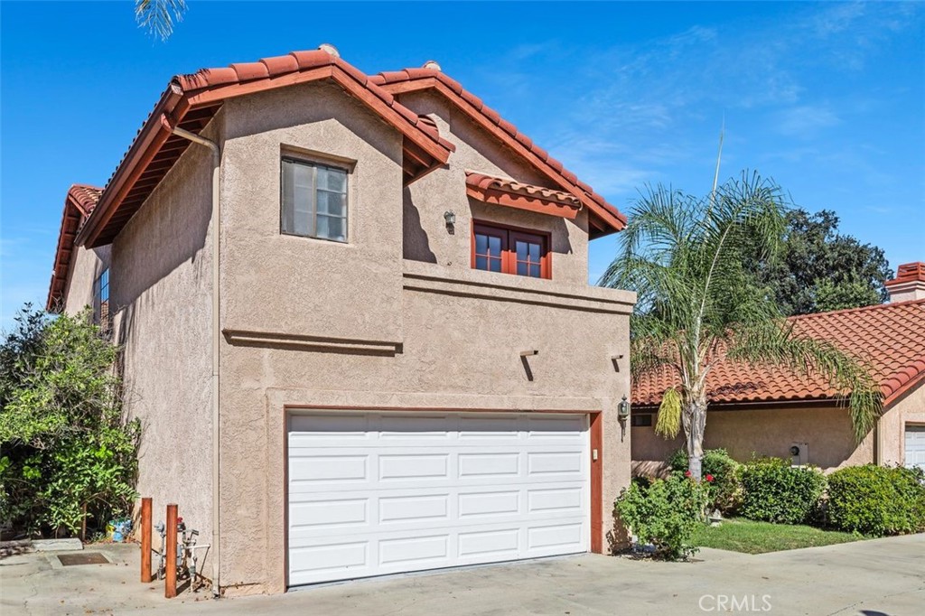 Welcome to the sexiest address in all of Reseda! This gated 4-bedroom, 3-bath home with a 2-car garage is beautified, secure, and ready for you. Step through the lush front yard into a private retreat that blends comfort and style. The updated kitchen opens to inviting living spaces, while a downstairs den doubles as a 5th bedroom or home office. Upstairs, your primary suite offers a spacious closet and spa-like soaking tub, complemented by serene secondary bedrooms designed for total tranquility. Close to shopping, dining, schools, and everything you need—this home is equal parts convenience and sanctuary.