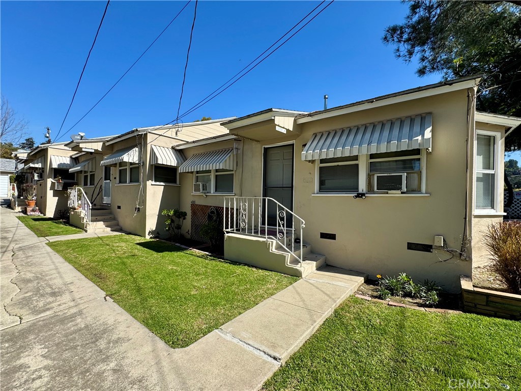 ***BACK ON THE MARKET AT NO FAULT TO THE PROPERTY - BUYER UNABLE TO PERFORM*** GREAT INVESTMENT OPPORTUNITY. Perfect for the savvy investor looking for some great passive income. The front unit is a 1 bed/1bath 676 sq.ft. living space which boasts updated features including a remodeled kitchen with granite counters, a dining area within the kitchen and updated bathroom. Original hardwood flooring brings out the rich tones of medium oak. A spacious front living room allows for great entertaining space accompanied by a accommodating bedroom. The middle unit is a 1 bed/1 bath 676 sq.ft. living space with many original features, including a spacious living room an accommodating bedroom. The back unit is a 2 bed/1 bath 932 sq.ft. living space, larger bedroom and a separate outdoor laundry room. The property has a 720 sq.ft. 3 car detached garage space, currently utilized as a carport in addition to uncovered parking available. New exterior painting makes for an enhanced curb appeal. Within walking distance to Whittier College, and close to local restaurants, shopping, schools, parks and Uptown Whittier. Call for a showing appointment today!