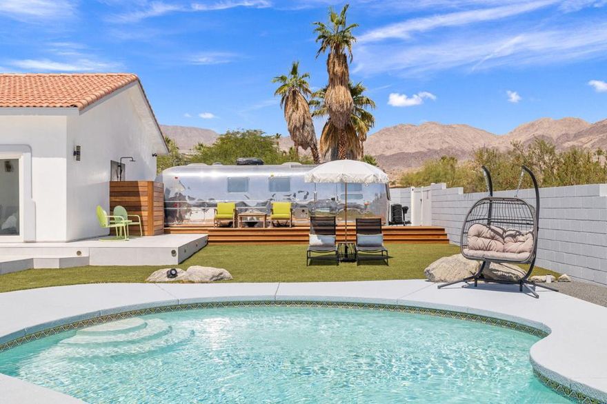 Modern Luxury Meets Desert CharmDiscover elevated living in this fully renovated and beautifully furnished retreat, ideally located in the coveted Silver Spur Ranch of South Palm Desert. This stylish four-bedroom, three-bathroom home was designed with intention--boasting premium finishes, vaulted ceilings, and a seamless blend of form and function.At the heart of the home, an expansive chef's kitchen showcases custom cabinetry, luxurious leather-finish countertops, and top-tier appliances. The oversized island offers both abundant storage and the perfect setting for entertaining. Throughout the interior, sleek tile flooring enhances the modern aesthetic, while all of the bathrooms also feature custom counters, cabinetry, and spacious tiled showers.Dramatic sliding glass doors open to a private backyard oasis with sweeping mountain and down-valley views. The low-maintenance landscaping, highlighted by stylish artificial turf, ensures beauty and convenience year-round. Whether hosting friends or enjoying a quiet evening under the desert stars, this outdoor retreat is designed to impress.Sustainable and serene, this solar-powered home is located on a quiet interior street and just minutes from El Paseo's boutique shopping, fine dining, and world-class golf. A perfect balance of desert elegance and modern convenience--your Palm Desert dream begins here.