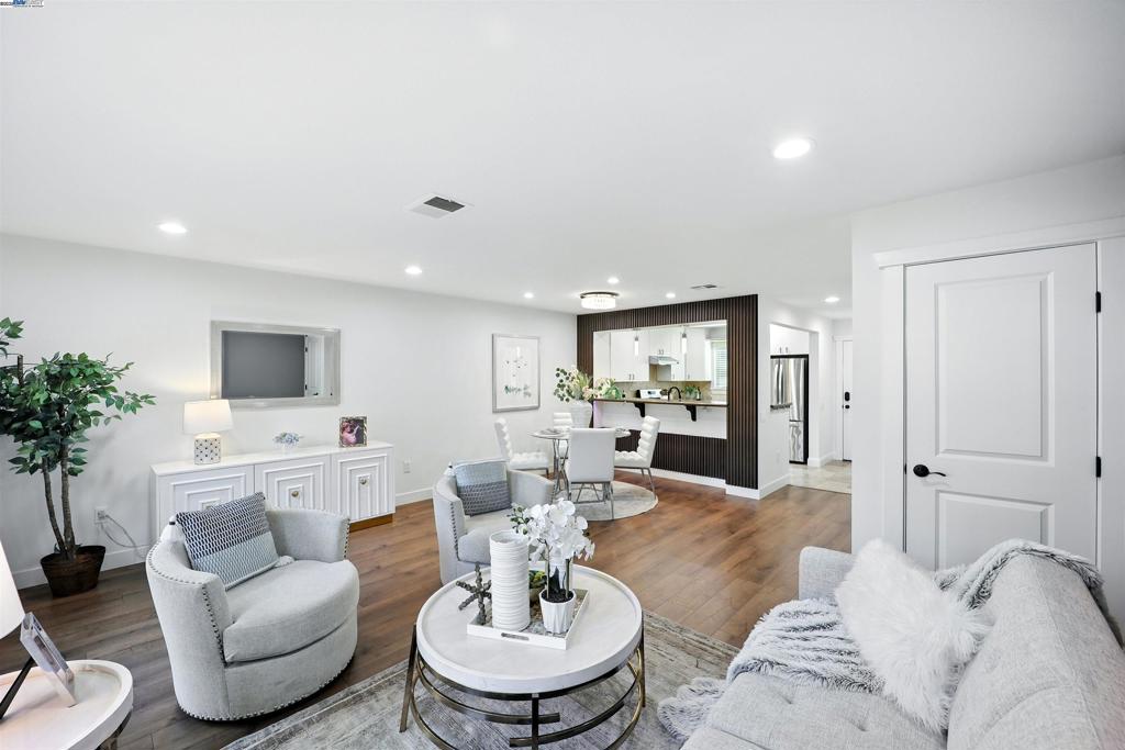 Beautifully remodeled town home in the heart of Silicon Valley, just minutes drive from Apple Park(1.7 mile away) and located in the top-rated Cupertino School District. This move-in ready home boasts over $35K+ in upgrades, including NEW kitchen appliances, washer/dryer, A/C unit and heating system, New LVP flooring, water pipes, faucets, toilets, interior paint, LED recessed and ceiling lights, light switches, accent walls, new fence, and more. Most replacement/remodeling were completed within last 12 months. The ideal floor plan features an open-concept living and dining area on the main level and two spacious bedroom suites upstairs. Enjoy resort-style living with HOA amenities such as two swimming pools, gyms, clubhouse, and playground. The covered HOA services include water, trash collection, exterior and roof maintenance. Prime location with easy access to freeway 280/85, Caltrain, and vibrant downtown areas of Sunnyvale and Cupertino. walking distance to 99 ranch and Fremont High School. A rare opportunity to own a turnkey home in a highly desirable neighborhood—don’t miss it!