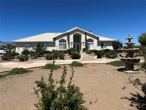 Photo of 9408 La Cadena Avenue, Oak Hills, CA 92344 (MLS # HD26151441)