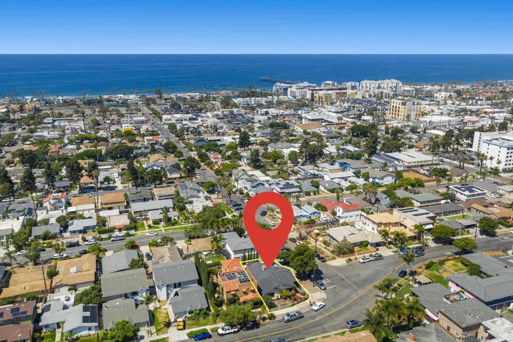 Don’t miss this charming Oceanside cottage located on a prime corner lot in the beautiful Seaside community of Oceanside. Original details and vintage craftsmanship including unique brick fireplaces, led glass windows, and warm wood floors give this classic coastal home a level of charm and character that is increasingly difficult to find. Whether walking to beaches, restaurants and shops in vibrant downtown Oceanside, curating a garden in the raised beds or lounging on the patio, this location offers the ultimate Southern California lifestyle. Low maintenance, ability to "lock and leave", and extremely walkable; this property checks all the boxes. Come see for yourself!