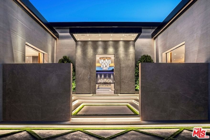 One of the most private and secured properties on the market today. Brand new resort-compound on Mapleton drive, one of the best streets in the Holmby Hills/ Beverly Hills/ Bel air area. Exceptionally built and designed single story style modern compound offers the ultimate in elegance, style and technology and features many additional unique and important amenities. A dedicated guard house with a full bath and kitchen, a chef's kitchen, an outdoor projection screen, home theater, bars and game rooms, gym and a championship level lit sports court with pickle ball/basketball. Approx. 19,250 SF under roof (approx. 15,350 SF air conditioned) feature a total of 7 bedrooms and 14 baths, two guest apartments with kitchenettes and living rooms, two additional guest suites with private patios and entrances, Shown to qualified buyers by appointment only.