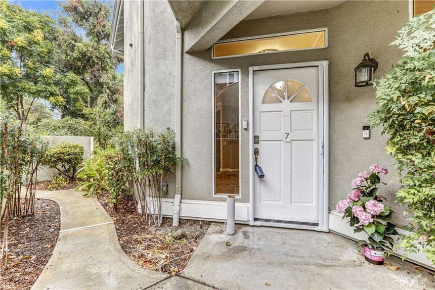 Incredible Move In Ready Prime Valencia Gated Arbor Park Community-No Rear Neighbors Privacy-Bright & Airy With Lots Of Natural Light, Open Floor Plan-Lower Level Single Level 2 Bedroom+2 Full Baths / Private Direct Access Garage & Additional Assigned Parking Condo-Thousands Invested in Recent Professional Upgrades & Remodel-New Kitchen, New Bathrooms, New Floors, New Paint, New Window Treatments, New Lighting...New Everything! Large Living Room With Upgraded, New Built Built In Entertaining Center with Built In Lights, Cozy Fireplace, New Paint, New Custom Lighting & New Custom Window Treatments-Breakfast / Dining Area Adjoins Kitchen & Has New Flooring, Bay Window Overlooking Back Yard, Double Sink Stainless Steel Sink with Custom Faucet, Stainless Steel Dishwasher, Garbage Disposal, New Paint, New Window Treatments & Custom Lighting Overlooking Private Landscaped Back Yard-New Chef's Kitchen Has New Cupboards, New Granite Counters, New Stainless Steel Top Of The Line Oven/Stove, New Recessed Lighting & Additional Custom Lighting, New Tiled Flooring-Second Bedroom Which is Separated From Living Room With Double Doors Is Perfect For Home Office & Has Built In Office Set Up Or Simply Remove & Bring Back As A Closet, Lots of Natural Light, Custom Flooring & Lighting Has Direct Access To Second Full Bathroom With Custom Vanity, Custom Flooring & Lighting-Primary Bedroom Has Custom Floors, Custom Recessed Lighting Plus Additional Custom Lighting, Custom Window Treatments, Large Mirrored Doors Closet With Built In Organizer, Large Slider For Direct Access To Secluded Private Back Yard-Many Thousands Invested In Remodeling Primary Bathroom Which Is Attached To Primary Bedroom, New Double Sink Vanity, New Custom Sinks & Fixtures, Huge Mirrored Closet, Custom Tiled Flooring, Huge Walk In Shower With Top Of The Line Fixtures, New Granite Walls & Glass Shower Door. Recessed Lighting & Gorgeous Mirrors. Hallway Has Large Closet, Direct Access To Second Bathroom-Inside Laundry Room With Storage And Room For Large Side By Side Washer & Dryer-Whole House Vacuum Cleaner System-Oversized Garage Has Storage Shelves, Direct Access To Home, Garage Door Opener/Additional Assigned Covered Parking-Secluded Back Yard for Family Gatherings & BBQ's. Guest Parking Throughout Community, Near Park, Pool & Spa. Walk To Summit Park, Hospital, Ralphs, Starbucks, Whole Foods, Valencia Town Center, YMCA, Granary Square, Tennis Courts, Near Freeway Access. No Mello-Roos. Low HOA Dues.