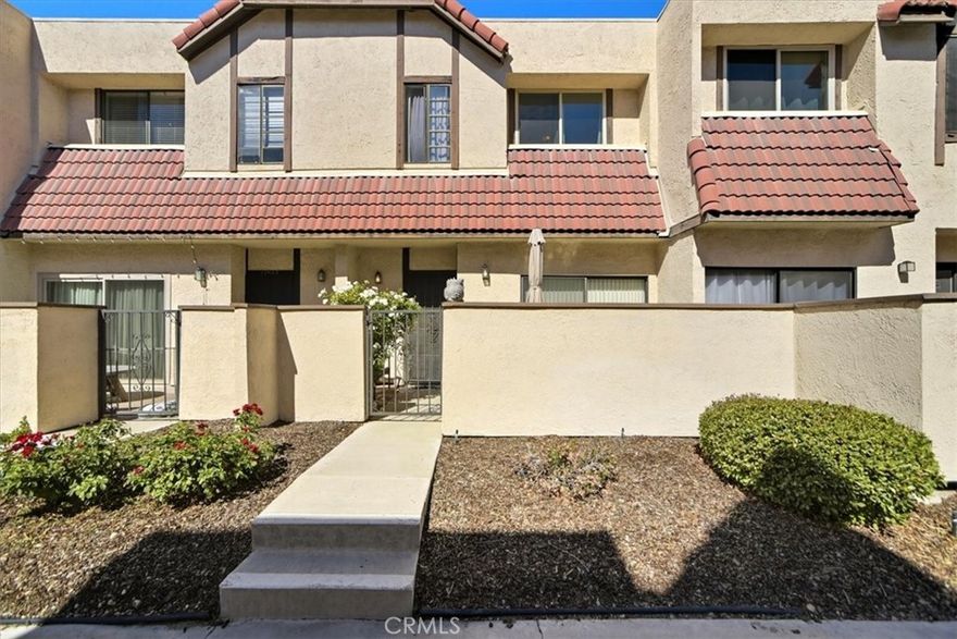 Welcome to this charming 2-bedroom, 2.5 bath townhome in the heart of Canyon Country! This beautifully maintained home offers 1,127 sq ft of living space featuring a bright and open layout, a spacious living room with a cozy fireplace, and a private patio perfect for relaxing or entertaining. The kitchen includes ample cabinetry and a convenient breakfast bar that opens to the dining area filled with natural light. Upstairs, you’ll find two comfortable bedrooms, each with its own ensuite bathroom and generous closet space. The attached two-car garage provides direct access and extra storage. Ideally located near Canyon Country Plaza, Costco, and a variety of local restaurants and shops along Soledad Canyon Rd, with easy access to the 14 Freeway for a convenient commute to the San Fernando Valley or Antelope Valley. The community offers well-maintained grounds, a sparkling pool, and a relaxing spa.