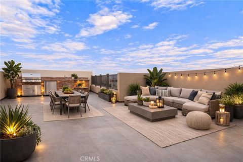 Photo of 809 Brickyard Lane, Costa Mesa, CA 92627 (MLS # PW26045511)