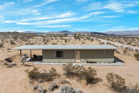 Photo of 2570 N Deer Trail, Landers, CA 92285 (MLS # JT25140775) Photo of 2570 N Deer Trail, Landers, CA 92285 (MLS # JT25140775)