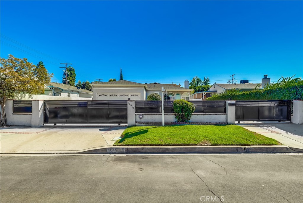 Beautifully updated 3 bed, 2 bath home located in one of the most desirable neighborhoods of Valley Village. This property features modern flooring throughout, a bright open layout, and a remodeled kitchen with quartz countertops. The home sits behind a gated entrance with a huge circular driveway and a two-car garage. The primary bedroom has it's own on suite bathroom, while the other two bedrooms share a bathroom. The spacious backyard offers a large pool and plenty of room for outdoor entertaining. A wonderful, move-in ready home not to be missed.
