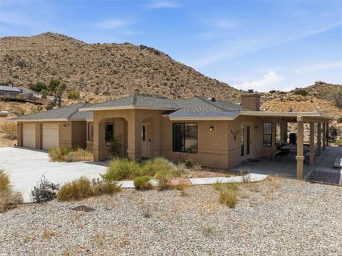 Photo of 7818 Rockwood Road, Joshua Tree, CA 92252 (MLS # IV26136216)