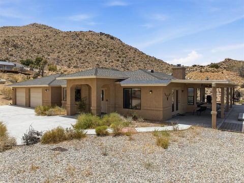 Photo of 7818 Rockwood Road, Joshua Tree, CA 92252 (MLS # IV26136216)