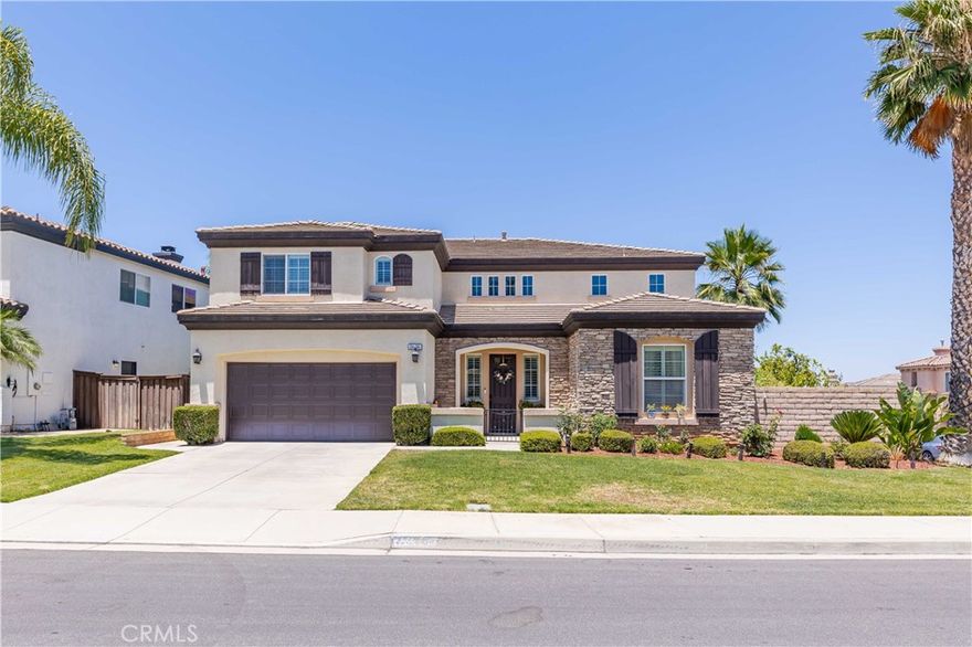 GORGEOUS South Corona Montecito Ranch Home, Ready to move in, Turn Key. GREAT LOCATION. LOW HOA's and LOW taxes. This BEAUTIFUL Home is near Dos Logos and is located at the foot of the Cleveland National Forest with Orange Groves and Avocado Trees. This home is the favorite plan 1 in our community. Corner lot featuring a 3 car Tandem Garage and a Courtyard. The entry has a Dramatic ELEGANT Spiral wrought iron Staircase. Featuring a Large Open floor plan, Spacious Granite Kitchen with a breakfast bar, newer appliances, walk in Pantry & Double Ovens. LARGE GREAT ROOM with fireplace, Upgraded flooring and neutral paint. Downstairs bedroom with a private bathroom. Formal separate Living Room and Dining for your entertaining needs and a powder room for guests. EXTRA LARGE PRIMARY BEDROOM SUITE WITH RETREAT & Fireplace that leads to the balcony to enjoy the Beautiful Mountain views. Primary features his and hers separate walk-in closets. Primary bath has Jetted Tub, dual sinks & separate Vanity area. LARGE-SIZE BEDROOMS with Jack & Jill Bathroom. Upstairs Laundry includes a sink. Backyard has 2 patio's, storage shed and fruit trees: orange, peach, guava, green apples, fig, pomegranate, persimmons, loquats and grapevines. Nearby park with basketball & baseball diamond. Top Rated Elementary School in the District. Nearby parks with playground, basketball and baseball diamond. THIS HOME IS A MUST SEE, MUST HAVE! Gorgeous ! Very well taken care of, will not disappoint. CLEAN,CLEAN, CLEAN. Perfect for extended family such as Grandparents or Nanny to live downstairs.