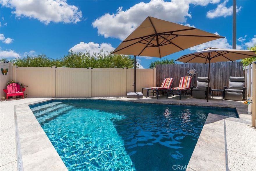 THE ONLY RESIDENCE IN THE VILLAS AT HARBOR POINTE WITH A CUSTOM IN-GROUND POOL! This standalone home offers an exceptional combination of privacy, luxury, and family-friendly living. Located on a quiet cul-de-sac with no neighbors on either side, it provides a peaceful retreat within the gated community. This home is an unmatched value in price and in one-of-a-kind features. 



Inside, the open and sunlit floor plan features high-end finishes including stainless steel appliances, quartz countertops, laminate wood flooring, and custom plantation shutters. Central air conditioning ensures comfort year-round. A whole-house water filtration system with reverse osmosis provides clean, refreshing water throughout.



Enjoy the private side yard with your own private SPA Jacuzzi while you gaze at the lush grass and floral landcaping that complements the seamless indoor/outdoor flow. Controlled gate access and a two-car garage add convenience and security.



With multiple bedrooms designed to accommodate family living, plus community amenities like BBQ's, grassy parks, a playground, and a dog park for the community, this home combines a tranquil setting with easy access to freeways, shopping, and hospitals. You literally just need to bring your toothbrush and you're home.
