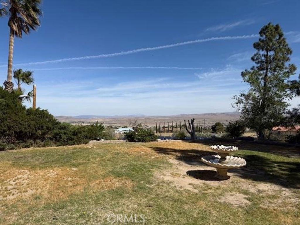 Photo of 27572 Highview Ave, Barstow, CA 92311 (MLS # HD26083990)