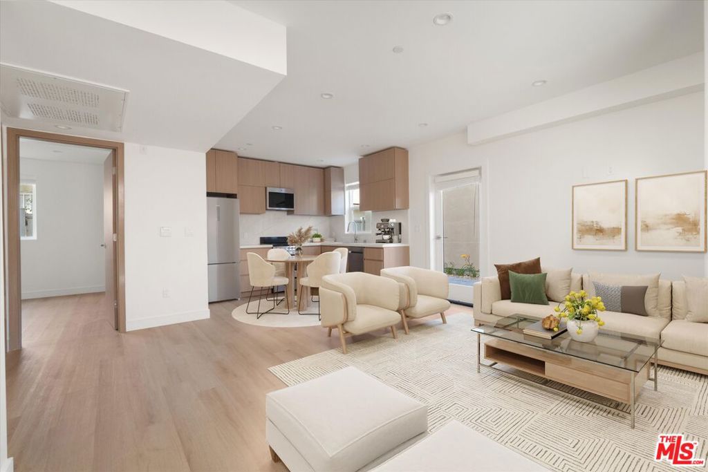 Modern ADU with Private Patio in Prime Sherman Oaks! Discover this stylish 2-bed, 2-bath JADU designed for modern living. Step into an open-concept kitchen and living area featuring brand-new stainless steel appliances, quartz countertops, vinyl plank flooring and abundant natural light throughout. The primary suite offers a comfortable retreat with an en-suite bathroom, while the guest bedroom is conveniently located next to a full bath and in-unit stackable laundry. Enjoy your own private, enclosed patio perfect for outdoor dining or weekend grilling. Just moments from the Sherman Oaks Galleria, Regal Theatres, Whole Foods, and easy access to the 405, this home delivers modern comfort in one of LA's most convenient locations.