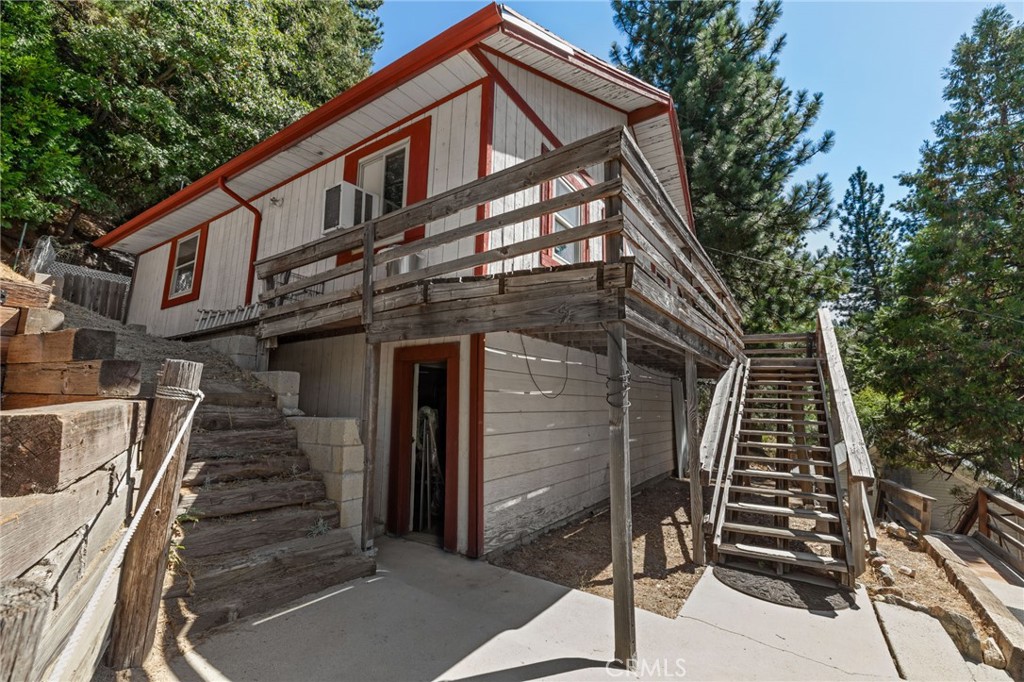 This charming mountain home offers a perfect opportunity to create your own private retreat. Offering 866 square feet of living space, the property features a versatile layout with two bedrooms and 1.5 bathrooms on the main level, plus an additional bedroom and half bath in the basement, ideal for guests, a home office, or extra storage. This home invites creativity and vision for updates and personal enhancements. Whether you're searching for a weekend getaway, a full-time residence, or an investment opportunity, this property offers the potential to craft a peaceful, welcoming space to call your own. With a little care and imagination, it’s ready to be transformed into something truly special.