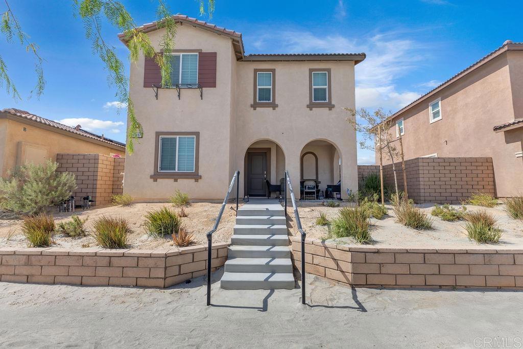 Welcome to 67497 Rio Rosalia Road, a beautifully crafted 3and comfortable living. With 1,466 square feet of interior space, it’s an ideal fit for families, professionals, or anyone looking to enjoy the be-bedroom, 3-bathroom home with a spacious loft, located in the desirable Verano neighborhood of Cathedral City. Built in 2021, this two-story residence offers the perfect blend of modern design and functional layout. Step into a beautifully remodeled kitchen featuring brand-new quartz countertops, modern cabinets and luxury vinyl plank flooring throughout. The kitchen and dining areas flow seamlessly into the living space, with contemporary finishes and ample natural light enhancing the welcoming feel. A full bedroom and bathroom on the main floor add convenience and flexibility—great for hosting guests, setting up a home office, or multigenerational living. Upstairs, you'll find two generously sized bedrooms, including a well-appointed primary suite with its own private bath and tranquil views. A third full bathroom is located just off the hallway for added convenience. The home also features central heating and air conditioning, a dedicated indoor laundry closet, and durable laminate and carpet flooring throughout. Out back, a low-maintenance yard offers a private space to relax, entertain, or enjoy the scenic mountain backdrop. The detached two-car garage provides secure parking and extra storage, while additional street parking is easily available. Located just minutes from schools, parks, shopping, and dining, this move-in ready home offers the perfect mix of modern comfort and prime location in the heart of Cathedral City.