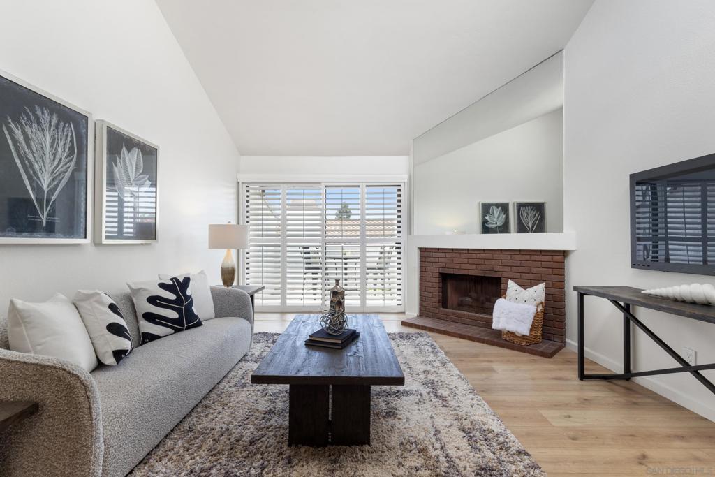 Welcome to this beautifully refreshed 2 Bed / 2 Bath, top-floor corner unit in the highly sought-after neighborhood of Paseo De La Costa in La Costa! This light and bright home features vaulted ceilings with skylights, plantation shutters throughout, brand-new luxury vinyl plank flooring, and fresh designer paint. The spacious layout includes a dedicated primary suite with its own full bath, a generous secondary bedroom, and open-concept living and dining areas that flow seamlessly onto a charming private balcony—perfect for enjoying peaceful views. Additional highlights include a full-sized washer and dryer in-unit, a detached one-car garage, and a reserved parking space located in front of your front door. Community amenities include a sparkling pool, relaxing spa, and a welcoming clubhouse. All of this in an unbeatable location—just minutes from premier shopping, dining, top-rated schools, and the iconic Omni La Costa Resort & Spa.