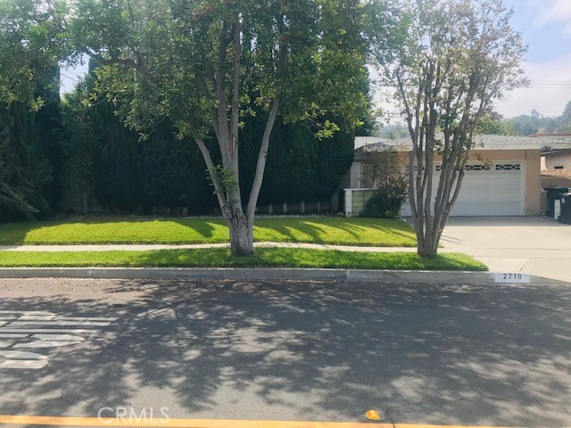 This 4 bedroom home has a great floor plan all on one level. kitchen has been remodeled. Mostly floor tile but with some carpet areas that needs to be replaced. Needs paint and carpet.
Has a large court yard in the front which is completely enclosed. There are two beautiful fireplaces- one in the family room and one in the living room. The garage is accessed from inside the home. Sunken Living room. The washer/Dryer area is adjacent to the Kitchen which has lots of cabinet space.. Has a large kitchen/Dining room area with a Den and a Living Room.
Great schools and neighborhood. Very close to the H MART grocery store.