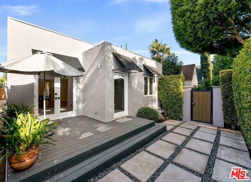 ELEGANT & SMART CONTEMPORARY HOME LOCATED IN WEST HOLLYWOOD'S BEST NEIGHBORHOOD, BORDERED BY ROBERTSON, MELROSE AND BEVERLY. REMODELED 3 BED, 2.75 BATH HOME WITH WOOD FLOORS THRUOUT, LIVINGROOM/DINING AREA WITH COVED CEILINGS, RECESSED LIGHTING & FRENCH DOORS TO PRIVATE FRONT YARD. CUSTOM TILE IN KITCHEN & BATHS, LARGE PRIMARY BEDROOM OPENS TO LOVELY & PRIVATE BACKYARD WITH VINE COVERED PATIO AND KOI POND. 2ND AND 3RD BEDROOMS ON SEPARATE WING, EACH WITH THEIR OWN BATHS. LARGE COOKS KITCHEN WITH STAINLESS STEEL APPLIANCES AND STONE COUNTERS.