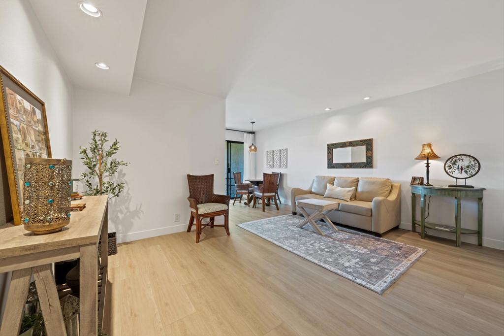 Beautifully updated and Turnkey Furnished single level condo ideally positioned along Palm Springs' Tahquitz Creek Golf Course. Enjoy captivating views of the fairway and surrounding mountains from inside and the private patio. This Move-In Ready-Easy-To-Maintain home blends comfort and style with curated interiors, open-concept layout blending the Kitchen, Dining Area, and Living Room. Bedroom #2 with closet is currently a Den with sofa bed opening to the living area with curtain for privacy if desired. Primary Bedroom with wall-to-wall closet. Both Bedrooms Share Tub and Shower. Luxury vinyl plank flooring throughout. Recessed Lighting. Window Treatments. Nest Thermostat. Laundry Closet. Move-In Ready! Close to parking with 2 Parking Permits. Close to community Spa. Experience effortless desert living here. Palm Springs Golf & Tennis offers 3 heated pools, 4 spas, 4 tennis courts with pickleball, and Clubhouse. HOA dues include water, trash, cable, and internet. You own the land. All reasons to consider this the ideal full-time residence, seasonal getaway, or income-producing rental with 30-day minimum.