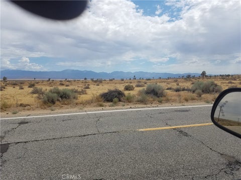 Photo of 100 Avenue R4, Sun Village, CA 93543 (MLS # SR26227634)
