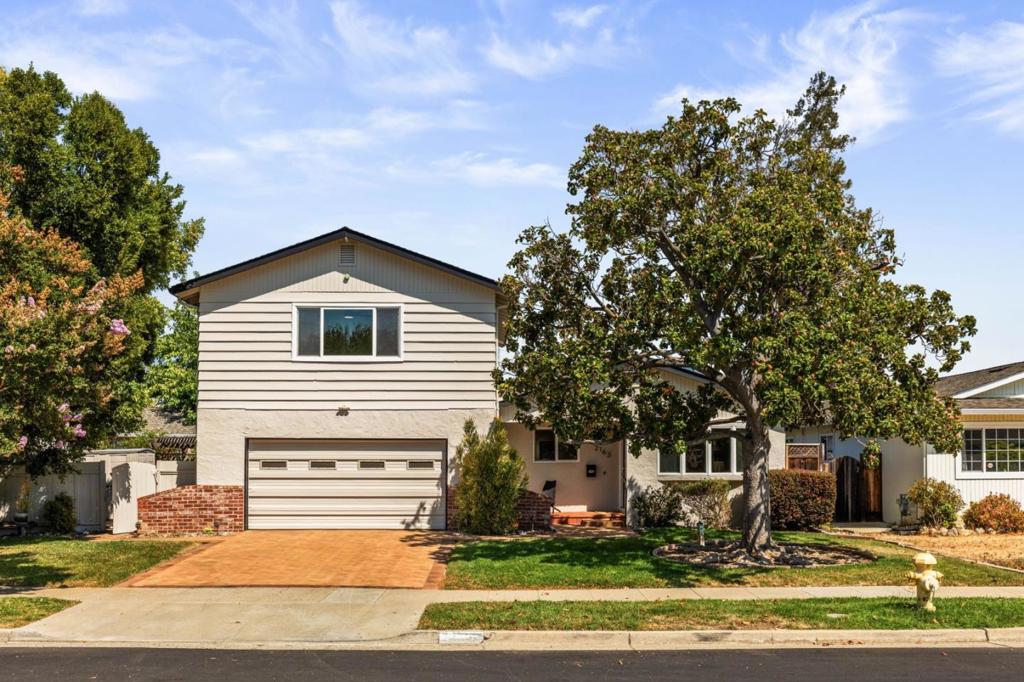 Welcome to 2163 Ebbesen Avenue! This beautifully updated home is located in Cambrian Park, one of San Jose's most sought-after neighborhoods. Offering 2,077 sq. ft. of living space on a generous 9,945 sq. ft. lot. Inside, you'll find 4 bedrooms and 3 full baths, the primary suite is located on the main floor. It offers tall ceilings, walk-in closet, & remodeled bath. The kitchen is well-appointed with granite countertops, a gas cooktop, recessed lighting, and stainless steel appliances. Upstairs features 2 bedrooms, a full bath, and a large storage closet, along with its own climate control system for added comfort. The home also offers versatile flex space, perfect for an office, formal dining room, workout area, reading nook, or creative space. The expansive family room is ideal for everyday living, relaxing, or hosting gatherings, enhanced by abundant natural light from numerous skylights & windows. Step outside to enjoy the spacious backyard, complete with multiple seating areas, plenty of shade, and a charming gazebo, an inviting setting for outdoor dining and entertaining. Located in a quiet neighborhood with highly rated schools, and just minutes from parks, shops, dining, and freeway access, this home truly has it all. Don't miss out on this lovely home!