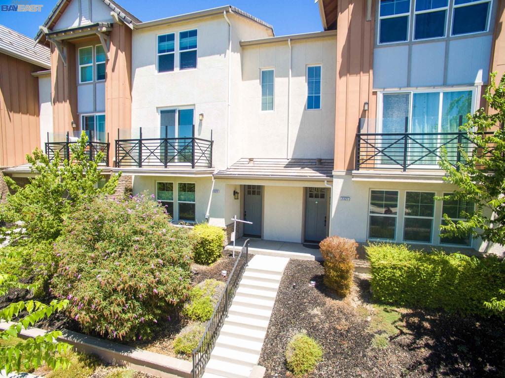 Beautiful south facing home at Trio at Jordan Ranch. Enjoy distant hills view to the south from LivRm balcony and BR windows. Easy access to Fallon Sports Park, Shops & Market at Fallon Gateway Plaza, the San Francisco Outlet, and easy freeway access. Across street is the newer Cottonwood Creek K-8 grade school, & the 2nd Dublin high school is nearby. A bedroom with full bath & W/I closet on the first level (also great for in-law suite or home office), a bedroom, full bath, kitchen, dining room, living room and laundry room on the 2nd level, and master bedroom suite and fourth bedroom on the upper level, each with their own bathroom. Gourmet kitchen with steel appliances & slab granite countertops, gleaming hardwood flooring, and ready to move in and make this your home. Frig, Washer & Dryer Stay. SELLERS ARE MOTIVATED. PRICE REDUCED AS SELLERS HAVE BOUGHT ANOTHER HOUSE.