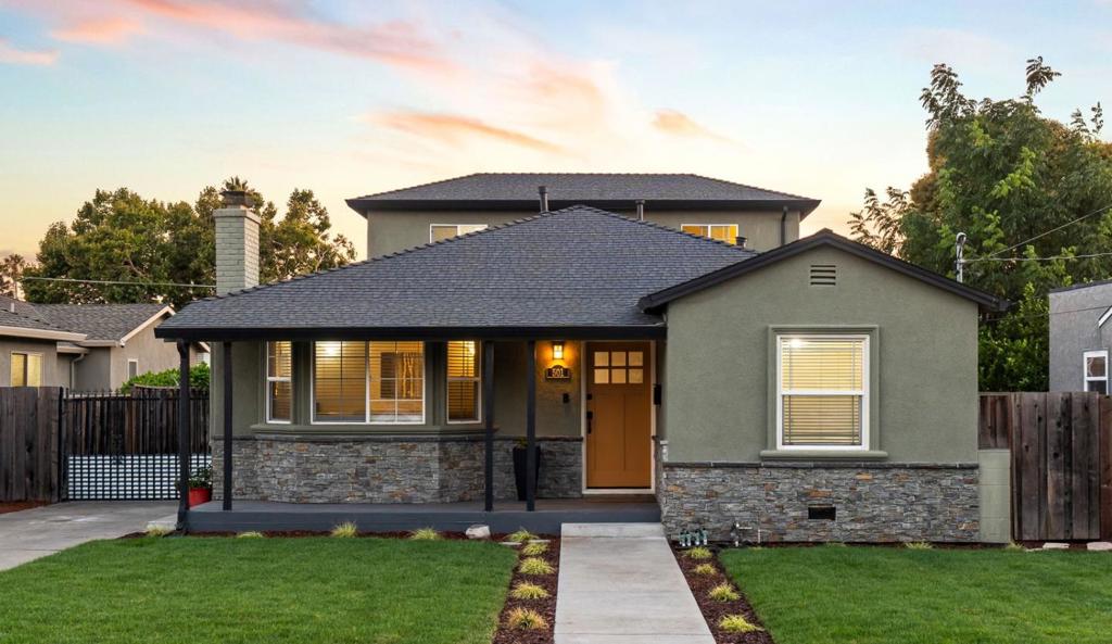 Where timeless Willow Glen charm meets modern luxury, owned by the same family since its construction, this home blends rich history with a contemporary transformation. A 2006 remodel and second-story addition brought elevated style, space, and functionality. Featuring an expansive chefs kitchen with granite counters, custom cabinetry, and premium appliances. The spacious ground-floor primary suite offers dual sinks, a walk-in closet, and a slider to the back yard. Entertain with ease in the inviting living room, generous family room, and dining spaceor step outside to your island-inspired retreat with a tiki bar and palm-shaded lounge. Additional highlights include updated baths, all-copper plumbing, central HVAC with A/C, and a detached garage rebuilt in 2006. Just a short stroll to downtown Willow Glens shops, dining, and coffeehouses, and moments from the Three Creeks Trail. Quick access to 87, 280, Tamien Train & Light Rail station, and only 7 minutes to Mineta International Airport make this the perfect blend of lifestyle and location.