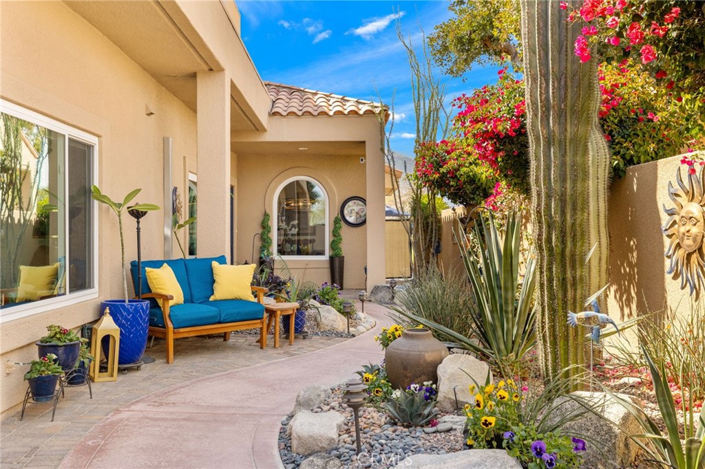 Experience Unparalleled Comfort and Views in Mission Hills Country Club... MOVE IN ready! Nestled along the greens of this prestigious Club, this beautifully maintained home showcases pride of ownership and breathtaking golf course and mountain views. Step through the private, recently re-landscaped courtyard and into a light-filled retreat featuring soaring ceilings and thoughtfully updated finishes. This sought-after floor plan includes two spacious master suites and a versatile third bedroom that easily functions as a flex space to suit your needs. The kitchen has been upgraded with new smart appliances, while recessed lighting, ceiling fans, and an Ecobee smart thermostat enhance comfort and efficiency. Additional upgrades include new double-paned windows, a new AC unit with attic ducting, and a new water heater with a circulating pump. The home has also been recently repainted, ensuring a fresh and modern feel. Enjoy the serene desert lifestyle with stunning views — especially when the surrounding mountains are dusted with snow! You can enjoy the peace of mind a guard gate community offers, along with the added security of the Ring doorbell & cameras technology. Don't miss this opportunity to own a meticulously maintained home in one of the most desirable communities in the Coachella Valley.