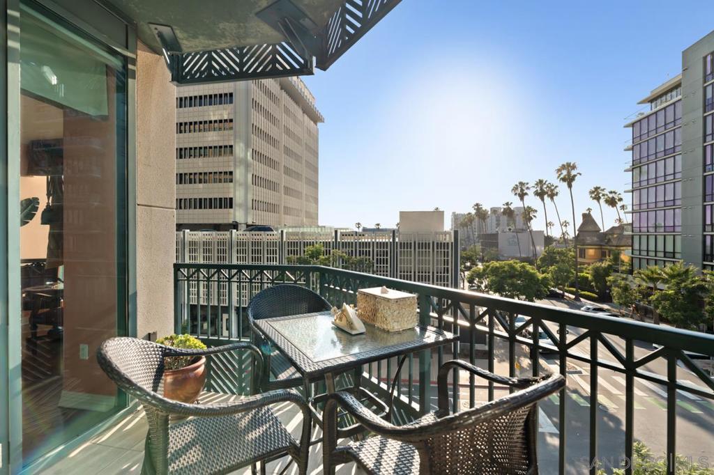 Welcome to this elegant 4th-floor northwest-facing residence offering private elevator access directly into your home. Located in one of the most prestigious buildings in the area, this sophisticated condo blends luxury, security, and convenience in the heart of the city. This single level condo with elevator to your foyer, offers 9' ceilings, wood floors, Viking & Bosch appliances, and custom wood cabinetry. An elegant fireplace anchors the spacious living room, which includes a cozy breakfast nook and a kitchen with sweeping views of Balboa Park. Live where convenience meets sophistication, this is the lifestyle you deserve! Residents enjoy a wealth of resort-style amenities, including a 40ft heated lap pool, spa, expansive sundeck, state-of-the-art fitness center, recreation lounge, BBQ area, executive-style conference room, and a beautifully appointed mezzanine deck overlooking iconic Balboa Park. The building also features 24/7 front desk concierge, on-site management, and advanced security including leak detection sensors monitored by the HOA for your water heater, washer, refrigerator, dishwasher, and kitchen sink. This home includes two parking spaces with a private storage unit. Enjoy the best of San Diego’s cultural scene with galleries, exhibits, and the renowned Old Globe Theatre minutes away.