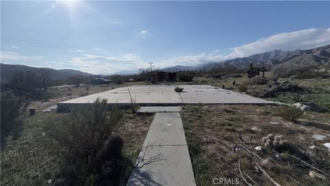 Photo of 9176 Rose Eden Dr, Morongo Valley, CA 92256 (MLS # IG26014243)