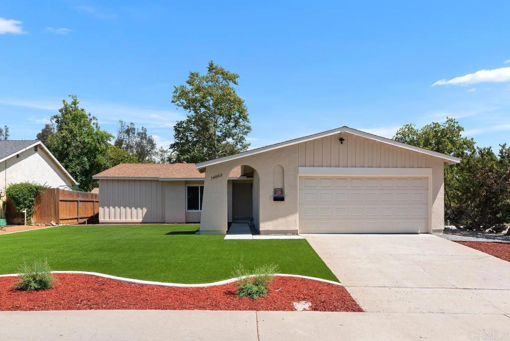 Welcome to this stunning single-story home in the heart of Poway! This thoughtfully remodeled 3 bedroom, 2 bath home offers 1344 sq.ft. of modern living with stylish upgrades throughout. Step inside to find an inviting marble fireplace with custom mantle, brand-new vinyl plank flooring, and abundant natural light through new dual-pane windows. The updated kitchen boats new appliances and countertops, perfect for cooking and entertaining. Both bathrooms have been refreshed, the master bedroom has a walk-in closet, and the home is move-in ready with a new furnace and central air conditioning for year-round comfort. Outside, enjoy low-maintenance living with turf landscaping in both front and back yards, ideal for relaxing or play. The generous 2-car garage is completely finished, offering additional storage or workspace. With NO HOA fees, this home is conveniently located within walking distance to schools, shopping, and parks, making it a perfect choice for families and those who love the Poway lifestyle. Don't miss this turnkey gem. Virtual picture of living room.