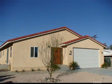 Photo of 378 West Rosa Parks Road, Palm Springs, CA 92262 (MLS # OC26126915)
