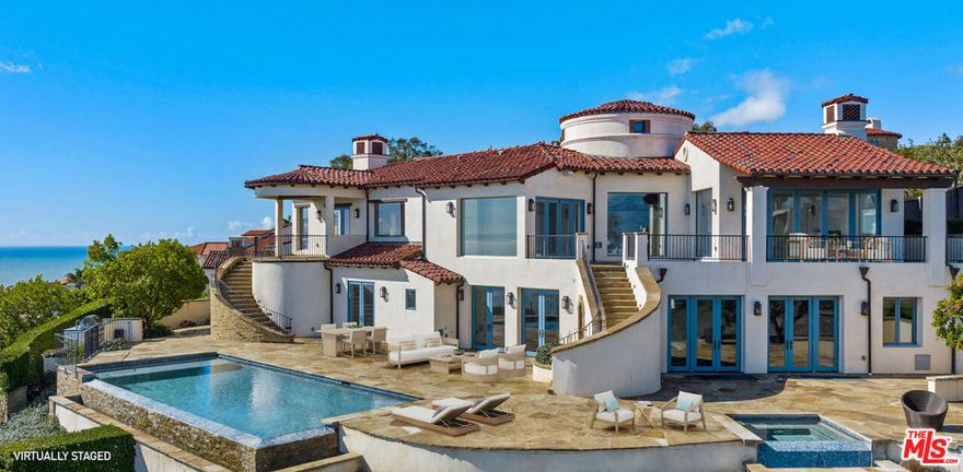 Unlock the door to a world of refined coastal elegance. Perched on a peaceful cul-de-sac atop Santa Barbara's desirable Mesa, this exceptional 4-bedroom, 4.5-bath residence offers an exquisite fusion of luxury and tranquility, framed by sweeping views of the ocean, islands, and mountains. A grand entrance welcomes you into voluminous interiors adorned with soaring ceilings, walnut wood floors, and walls of glass that invite an abundance of natural light while capturing the breathtaking vistas. The open-concept layout seamlessly unites indoor sophistication with the serenity of the outdoors, creating an ideal backdrop for both intimate gatherings and grand entertaining. Step outside to your private resort-style haven, where an infinity-edge pool, spa, and expansive patio offer the ultimate setting for alfresco dining, relaxation, and celebrationall set against the endless horizon of the Pacific. Additional amenities include a 3-car garage, outdoor shower, and built-in BBQ. Perfectly positioned for both convenience and lifestyle, the home is just moments from beloved local cafs, grocery stores, restaurants, and world-class beaches, blending everyday ease with the allure of a dream coastal retreat. This architectural jewel is more than a homeit's a lifestyle. Embrace the beauty, serenity, and sophistication of coastal living at its finest.