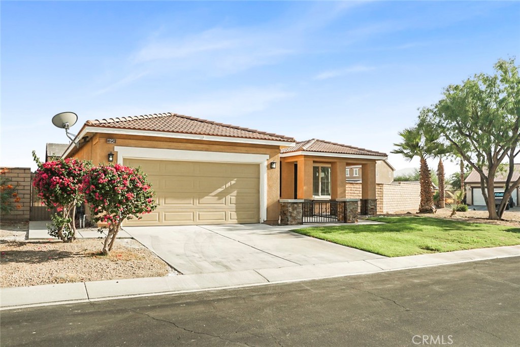Welcome to your beautifully updated desert retreat! This completely updated residence floor plan offers 4 bedrooms, 2 bathrooms, 1,573 sqft. of modern living space on a generous .25-acre lot. Nestled in the highly desirable, gated neighborhood of Talavera, this property offers the perfect balance of style, space, and privacy.
With new flooring, paint, electrical upgrades, and more, this house offers 4 spacious bedrooms, 2 thoughtfully updated bathrooms on an expansive corner lot. A bright, open layout with a spacious living area and cozy family room featuring a gas fireplace, next to a fully updated kitchen with a large center prep island, ample cabinetry, beautiful plank flooring, and stainless appliances are included.
This home is located in the highly sought-after North Indio community, which offers low HOA dues, gated security, beautifully maintained parks, and BBQ areas.
You’re also minutes from world-famous attractions like the Coachella and Stagecoach festivals, Indian Wells Tennis Garden, Acrisure Arena, and local casinos for endless entertainment options. Your dream home awaits.