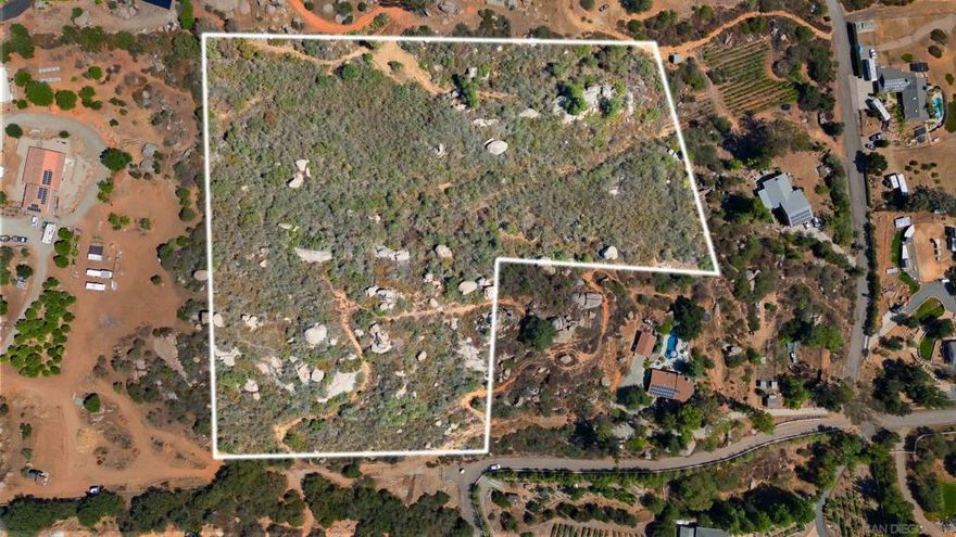 Discover this rare opportunity tucked off Chablis Rd, surrounded by established homes in one of Ramona’s most desirable neighborhoods. Spanning just under 8 acres, this property offers the perfect canvas to bring your vision to life.  Build your dream estate on the hilltop and enjoy sweeping panoramic views, or subdivide the land and create multiple homes for future investment. With a serene setting, breathtaking vistas, and utilities nearby, the possibilities are truly endless—whether it’s a custom residence, guest house, or development project.  Opportunities like this don’t come often. Claim your slice of Ramona near Mt Woodson and turn possibility into reality!