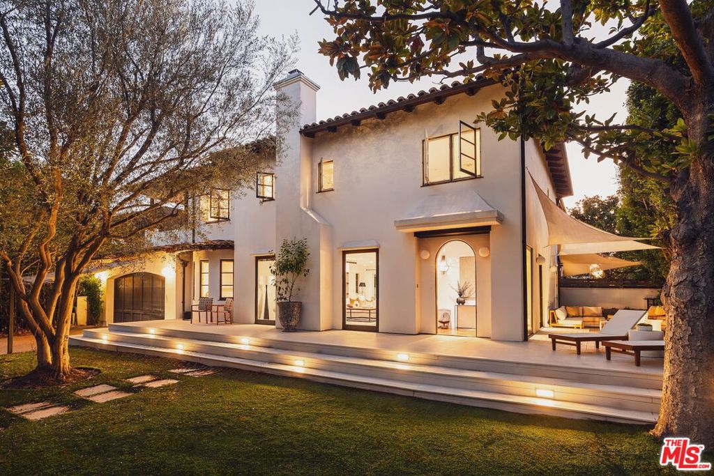 Located in a prime Brentwood location, 505 Moreno presents a rare opportunity to own a contemporary Spanish-style residence on an oversized 6,800+ sq ft lot. Set behind secure gates and surrounded by mature hedges, this warm Spanish contemporary home welcomes you. Featuring four bedrooms, four bathrooms, and more than 3,300 sq ft, this home exudes charm and sophistication. Upon entering, an inviting living room welcomes you, anchored by a fireplace, with charming sliding barn doors providing access to a home office, and on the opposite side, a spacious dining room with seating for eight. The dining room seamlessly leads to the chef's kitchen, featuring Viking and Sub-Zero stainless steel appliances, granite countertops, an additional temperature-controlled wine refrigerator, and access back into the main living space through a secondary living/reading area. One guest bedroom is located on the first floor with an en-suite full bathroom. Ascending upstairs, the sun-filled primary suite awaits. This retreat features an oversized balcony accessed through French doors, a large walk-in closet, and a luxurious en-suite bathroom. Two additional bedrooms with full en-suite bathrooms are also located upstairs, with one room featuring its own private balcony overlooking serene treetop views. Both additional upstairs guest bedrooms are finished to the same high standards found throughout the rest of the residence. Additionally, a playroom is found upstairs with the versatility to serve as a secondary home office, library, or workout roomwhatever best fits your lifestyle needs. Outside, multiple spaces for entertaining and relaxed living include a flat grassy area in the front, ample patio space for seating, and an additional patio with bar seating and a jacuzzi, all surrounded by tall hedges for ultimate privacy. 505 Moreno Ave offers a rare opportunity to live in a prime Brentwood location, neighboring the esteemed Brentwood Country Club, within walking distance to Brentwood Country Mart, and with easy access to all the Westside has to offer.