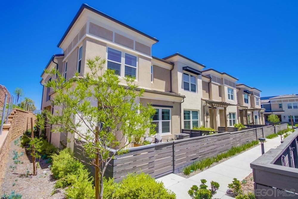 Fantastic Opportunity to own the builder's MODEL HOME in Lennar's AMBER at SUNRISE! END-UNIT 3 BEDROOM PLUS LOFT! Located on the western side of the complex secluded from the community driveways and common area walkways/parking areas. Southern and western exposure with extra west facing windows in living room, primary BR & stairwell that flood home with natural light. Mountain & sunset views from primary suite!! Luxury vinyl plank everywhere except inside the upper bedrooms. Designer upgrades throughout including wallpapers and wall treatments, Hunter Douglas solar shades, 3.6 KW PAID SOLAR PANELS, smart home features: Smart Door Locks, Smart Garage Door, Smart Shut Off water valves, Ring doorbell, upgraded bedroom carpet with ultra thick padding, second floor central loft perfect for den, office, or playroom. Ceiling mounted Atmos speakers for home theater. Upgraded counters and backsplash. Gated community w/pool, spa, "tot lot" & BBQ area. Make this FULLY UPGRADED MODEL HOME yours today!! ADA compliant powder room on lower level. Whole house water softener and conditioner. Kitchen reverse osmosis purified drinking water. Built in security systems. Car charging circuit in garage. Tankless water heater. Custom concrete work on private patio with smart irrigation. Gated community with pool, spa, "tot lot" and BBQ area. Make this FULLY UPGRADED MODEL HOME yours today!!