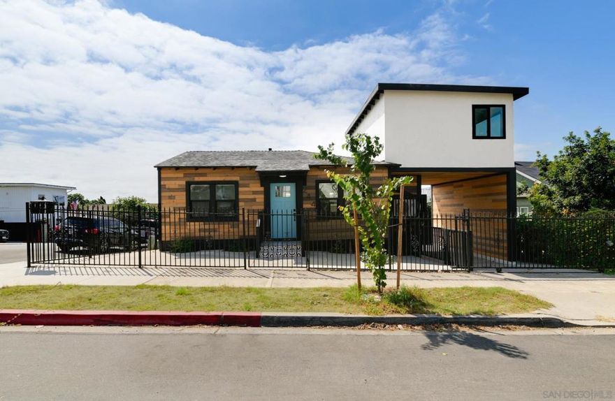 FULLY PERMITTED COMPLETE REMODEL!! Amazing 2bed/2bath home walking distance to Petco Park! 1 bedroom down, 1 bedroom up with views of Downtown and Coronado Bridge! Fully upgraded galley kitchen, open to LR, large breakfast peninsula, indoor laundry, gated parking, and more! Must see! Amazing exterior custom wood cladding. Fully fenced lot. Move-in ready. New paint inside and out, new flooring, new kitchen cabinets, new appliances, new bathrooms vanities, and more. Walking and biking distance to Petco Park, Gaslamp, Convention Center and the Marina. A must see!  Walking and biking distance to Petco Park, Gaslamp, Convention Center and Marina.