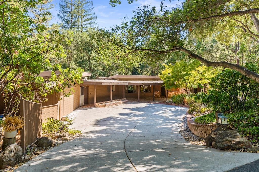 Welcome to 15050 Oriole Road located in the coveted Platinum Triangle neighborhood of Saratoga. Remodel the existing home or build your dream estate. Nestled in the heart of Silicon Valley, this expansive lot offers unparalleled tranquility, privacy, and breathtaking views. Set among multi million dollar estates, this premium parcel provides the perfect canvas for a luxurious estate with ample room for a main residence, guest house, pool, and outdoor living spaces. Surrounded by nature, yet minutes from vibrant downtown Saratoga, renowned wineries, top rated restaurants, and world class Saratoga schools. With utilities available and generous setbacks for optimal design flexibility, this is a once in a lifetime opportunity to create a retreat that reflects your personal vision and lifestyle. Don't miss this extraordinary chance to design and build your legacy home in one of the Bay Area's most sought after communities.