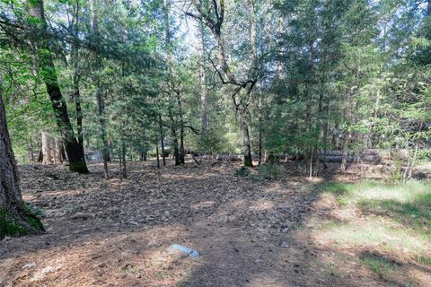 Photo of 16303 Niblick Rd, Cobb, CA 95426 (MLS # LC26039255)