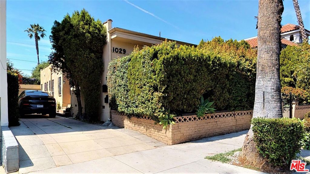 Amazing opportunity in West Hollywood to own triplex property consistent of two buildings. Live in one unit and rent out the other two or if you have some ideas of building new multi-unit property this project can be a perfect fit. Last pictures were taking from the top of the garage, and you can see the possibility of the unobstructed views that are possible if 3 story building is constructed. Views are from West to East, all the way to Hollywood sign. Conveniently located in the heart of West Hollywood, walking distance to your famous restaurants, shopping centers, bars, and clubs.