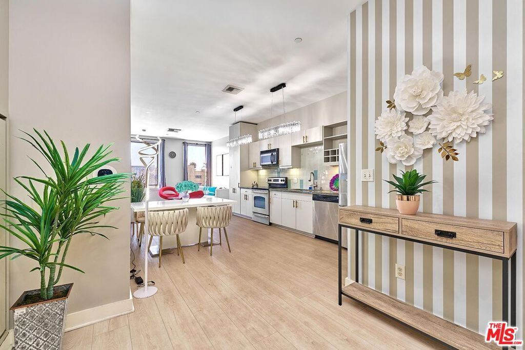 THIS IS IT!! LOVE THE PLACE YOU WANT TO LIVE, EVERYDAY!!! BE DIFFERENT, MOST EXCEPTIONALLY DESIGNED UNIT CURRENTLY AVAILABLE IN The Mercury CONDOMINIUM. THIS UNIT OFFERS THE BEST value for THE True high-rise living in Mid-Wilshire. SEPARATED BEDROOMS OFFER PRIVACY AND FUNCTIONAL SPACE FOR 2 Bedroom (2 PRIMARY LIKE ENSUITE BATHROOMS) & 2 bathroom bright SOUTH FACING unit, facing south. Unit features include bamboo floors, granite countertops, stainless-steel kitchen appliances, washer & dryer in unit. 2 assigned RARE FOR CITY OF LOS ANGELES, side-by-side parking spaces. 24 hour building security/CONCIERGE. Home to an exclusive resident-only SKYDECK, enjoy this breathtaking rooftop with panoramic and immaculate views to DTLA , the Hollywood Hills/HOLLYWOOD SIGN, & all-the-way to the Pacific. The rooftop comes equipped with a resort-style pool, Jacuzzi, state-of-the-art fitness complex, BBQ PICNIC area, and ZEN-INSPIRED lawn. Walking distance to every place, such as markets, restaurants, bakery, metro station, & etc. The MERCURY CONDO IS Centrally located for the first-time condo buyers or even as a second investment for those needs to be in the city. Assessor's sq footage is recorded at 910 Sf.