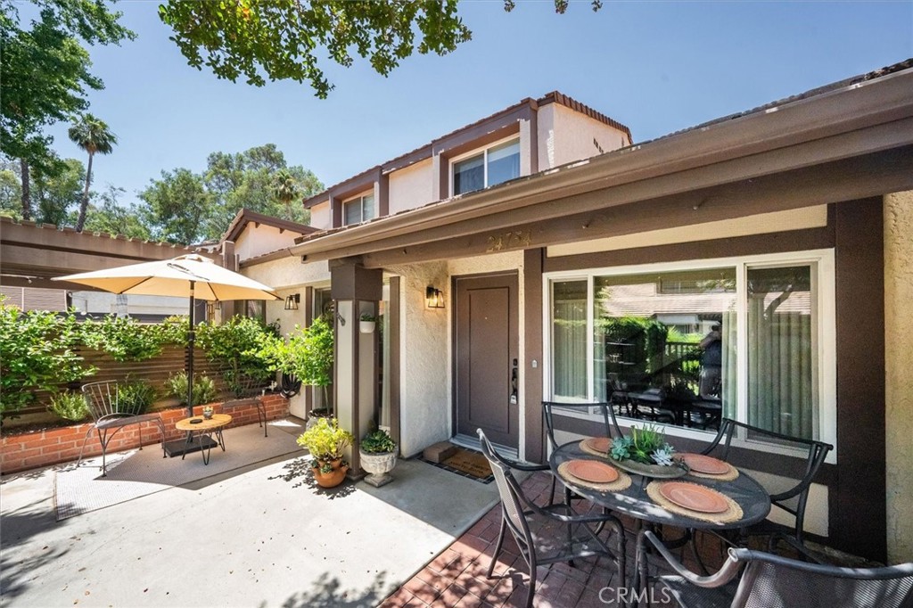 Charming 3-bedroom townhome in the highly sought-after Valencia Fairways community. This updated 2-story unit offers the perfect combination of character and modern convenience, with no neighbors above or below and an attached 2-car garage. Inside, you'll find fresh designer paint, luxury vinyl flooring, newer carpet and baseboards, dual pane vinyl windows, and custom window treatments. The kitchen features white cabinets and newer stainless steel appliances, and all bathrooms have updated vanities and toilets.
Additional upgrades include newer ceiling fans and lighting fixtures, integrated ceiling speakers in the living room, and mirrored closet doors in the bedrooms. A standout feature is the thoughtfully transformed entry closet, now a stylish and functional mudroom with shiplap, hooks, and cubbies. Outside, enjoy a private front courtyard with a custom slatted wall, new soil, fresh plants, and ground cover.
Major systems have been updated with a brand new variable speed 4-ton A/C unit and Nest thermostat, newer water heater, and replaced main electrical panel breakers and outlets.
Located in a prime Valencia location close to the freeway, Vista Valencia Golf Course, Cal Arts, and College of the Canyons. The HOA includes three pools and spas, tennis courts, basketball court, playground, common area maintenance, and security patrol. A wonderful opportunity to own a turnkey home in a beautifully maintained neighborhood.