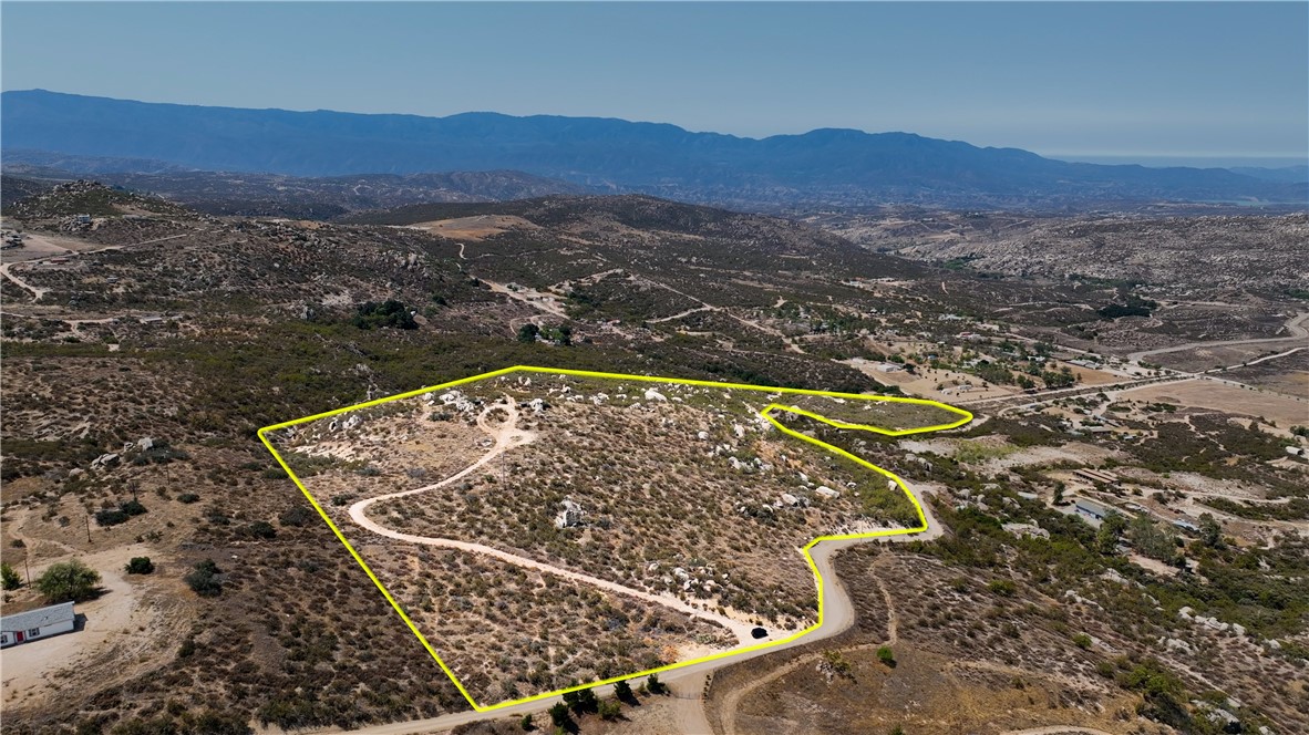 26.26 Acre Lot in Reed Valley area of Aguanga. This lot has Well with pump equipment and Electric Meter! Great hilltop view lot with a decent amount of usable land, gentle pad up top and some other gentle slopes. Zoning is R-A-20. This lot is close to paved road. The well is 800 feet deep and showed production at 52 gallons per minute at the time of the drilling in 2020.