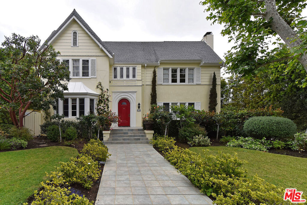 This Country English is in the heart of prestigious Hancock Park and is within walking distance to Larchmont Village in Windsor Square! This rare gem is totally updated with 5 bedrooms, 5-1/2 bath, plus a bonus room above the garage. It is in great move-in condition! The attractive red entry door opens to the newly refinished gleaming hardwood floors and the center hall hardwood stairs. The sunlit foyer leads to a generous living room with a cozy fireplace on the right, and a dining room designed for formal gathering on the left, adjacent to the butler's pantry and remodeled kitchen which showcases a 6 burner Thermador stove and a Sub-zero refrigerator. Enjoy a chat with a family member or friend in the family room/den while looking out on the serene backyard and sparkling pool. There is also a bonus room above the garage. A 3/4 bath sits between the pool and the garage for extra convenience after a swim. First floor also features an impressive half bath and a maid or guest quarter with a full bath. Upstairs has four well sized bedrooms: two bedrooms share a Jack and Jill bath, a guest bedroom is an ensuite with a spacious bath, and the master suite is a calm retreat, which offers his and her vanities, jet tub, walk in closet, and a fireplace! One of the Jack and Jill bedrooms leads to a balcony overlooking the backyard with a green lawn and pool. A bonus room sits on top of the 2-car garage that may be used as a hide-out or for your hobby projects. Valuable storage space is available in the attic. The basement includes the security system and the two zone air conditioning. This gem offers a superb location, everyday comfort, proximity to your beloved shops, cafes.....The best of central Los Angeles living!