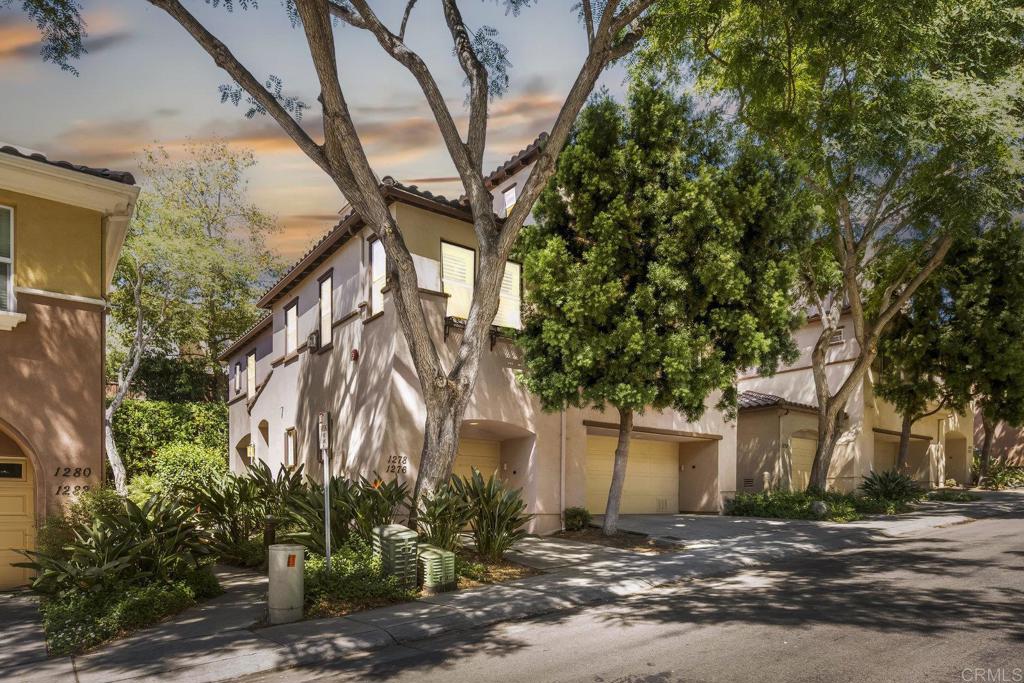 San Elijo Townhome in the Best Location! This open concept home flooded with natural light and ocean breezes is a must see in the highly sought after gated neighborhood of Westridge Village. Prime location in the heart of San Elijo Hills right near parks, town center, and top rated schools! Entertain friends or retreat to the sparkling resort style pool oasis with hot tub. This unit is extremely quiet but just a moments stroll to the pool or town center, achieving the perfect lifestyle balance. As you walk into the flowing floor plan, you are greeted with Italian glazed porcelain flooring featured in the entry, bath, and kitchen, along with gorgeous wood floors, and plantation shutters throughout. Sunlight filters into the home through the spacious patio showcasing a large storybook tree. The grounds are surrounded with beautiful birds of paradise and lush landscaping. The chef's kitchen features stunning Carrera quartz countertops and stainless appliances. A window over the large undermount sink lets in natural light and features a designer beveled subway backsplash. The remodeled guest spa boasts a quartz vanity and frameless walk-in shower that highlights 2 rainfall shower heads, designer porcelain plank tile, and a beach stone shower floor for ultimate luxury and relaxation. This bathroom even has custom installed Bluetooth surround sound! Upstairs in the master suite you will find views of the ocean, hills, and tons of natural light filtered through the greenery of the outside trees. The master features a walk-in closet, ceiling fan, and dual quartz vanity with Kohler brushed nickel faucets. Stroll by the San Elijo fountain to grab a cup of coffee, pick up groceries, or visit the local brewery. Open your front door and you are only steps away to dining at local restaurants or taking art and exercise classes. The community park right outside Westridge hosts summer movies in the park, weekend sports, holiday events, and more. Additional highlights include in-unit laundry, new fixtures, one-click gas fireplace, recessed lighting, central A/C, built-in closet shelving, smart home technology, rooms wired for Ethernet, overhead garage storage and flooring, and recently installed kitchen appliances. One of the closest homes in all of San Elijo Hills to the Elementary school makes this home a great long term investment! You will love this Westridge home in a perfect location! Minutes to Cal State San Marcos and just 8 miles to the beach! Conveniently close to the incredible amenities of living in the San Elijo Hills community: lighted ballparks, soccer fields, picnic tables, BBQ's, playgrounds, dog park, splash ground, community center, all within walking distance! Enjoy the new restaurants and shops along with 18 miles of trails, 19 acres of parks, & 1000 acres of open space. Zoned for award winning San Elijo Elementary, San Elijo Middle and San Marcos High School.