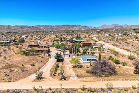 Photo of 1010 Wamego Trl, Yucca Valley, CA 92284 (MLS # JT26020617)
