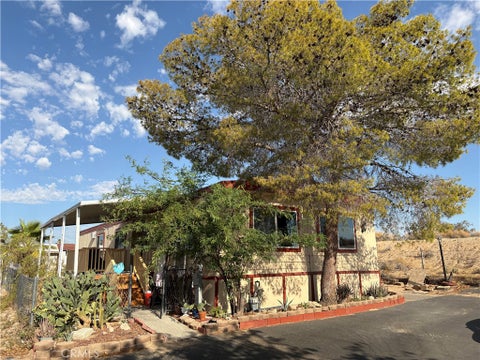 Photo of 6161 Ocotillo Avenue #36, 29 Palms, CA 92277 (MLS # JT26180136)