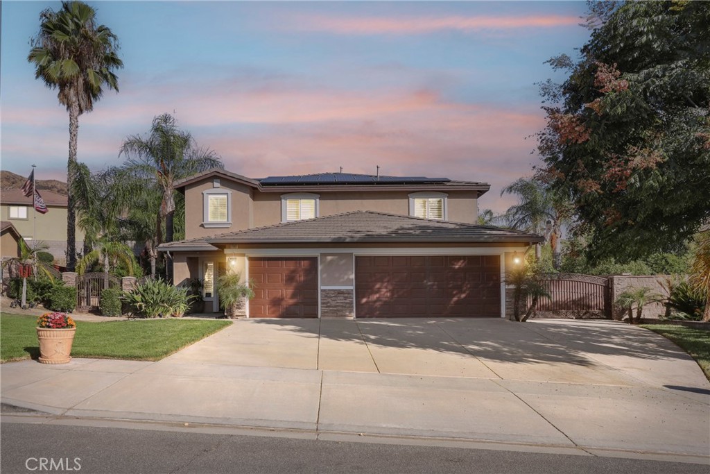 Welcome to this exquisite resort-style home nestled in the sought after community of the Ventana Estrada East Highland neighborhood. This elegant two-story home is a 4-bedroom, 3-bathroom home sitting on an expansive 17,424 sq.ft lot with 3138 sq.ft of beautifully designed living space, with a one-bedroom and full bath downstairs. This layout is ideal for multi-generational living or guests. Upstairs, you will find a flexible loft and work space that leads you into two additional bedrooms with one shared full bathroom. Plus, an oversized Primary Bedroom boasting dual sinks, walk-in closet, separate shower, and large soaking tub. The laundry room is conveniently placed upstairs with plenty of counter and cabinet space with a built in sink. Throughout the home you will find upgraded lighting, ceiling fans, newer windows, and plantation shutters. Step outside into your private dreamy resort-style living space in your own backyard. Enjoy the gorgeous built-in pool and heated spa with a waterfall. The gated yard features a covered BBQ/Bar and built-in gas fireplace for plenty of entertaining. A private staircase that leads you to your own serenity with quiet coffee mornings, meditation, exercise or simply to relax. The property also features a large RV parking space, mature landscaping, sprinklers, and a three-car garage for car lovers, tools and storage. Additional features include: Central heating and A/C, Tile roof and durable frame construction, Public water and sewer, Fireplace in the family room, Solar and Newer Windows. Located in a highly desired neighborhood with just minutes from freeways, the brand new Costco, Grocery Stores, Restaurants, and Mountain Grove and Citrus Plaza are only minutes away. This home is perfect for entertaining, relaxing, and enjoying all the perks of Southern California living.